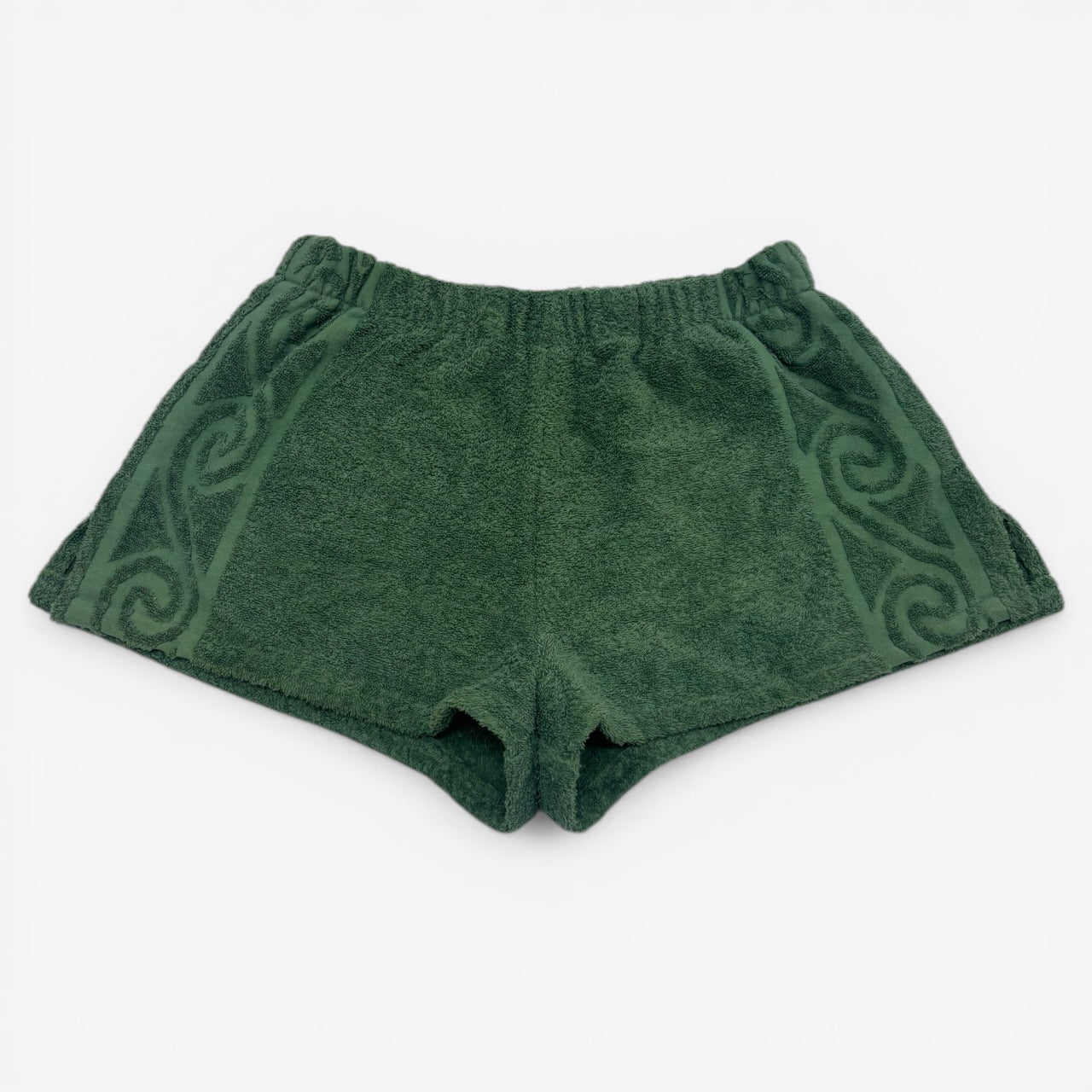 Green shorts with a pattern on a white background